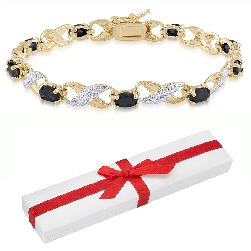 modern gold bracelet with charm -Dolce Giavonna Gold over Sterling Silver Diamond Accent and Gemstone Bracelet with Red Bow Gift Box