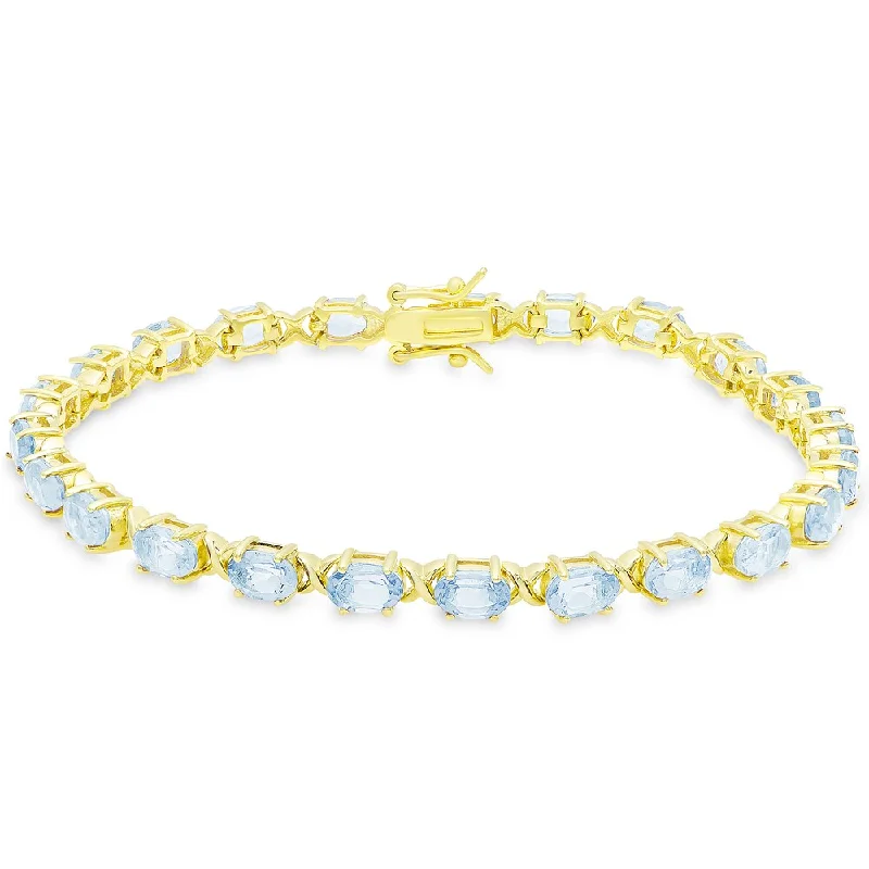 casual braided bracelet for men -Dolce Giavonna Gold Over Sterling Silver Oval Cut Blue Topaz XO Link Bracelet