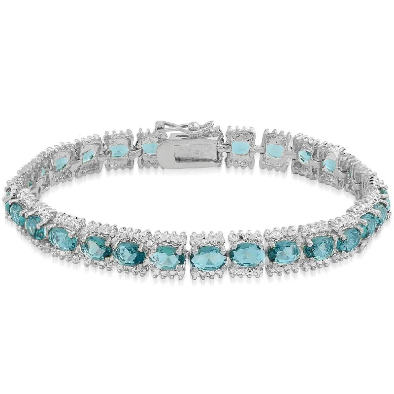 silver cuff bracelet for everyday wear -Dolce Giavonna Sterling Silver 15ct TGW London Blue Topaz and Diamond Accent Bracelet with Red Bow G