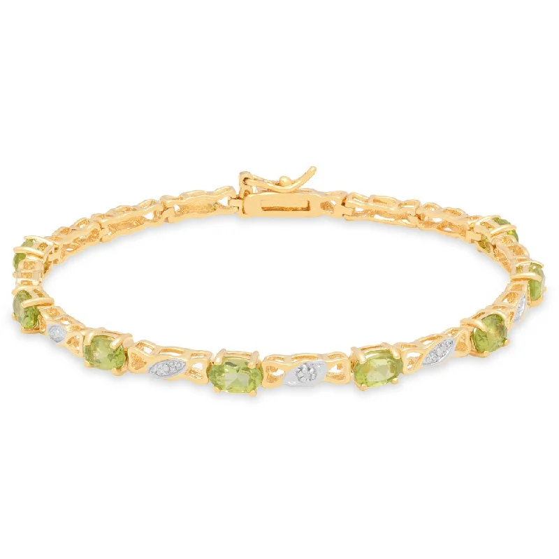 trendy boho bracelet for stacking -Dolce Giavonna Sterling Silver Peridot and Diamond Accent Bracelet