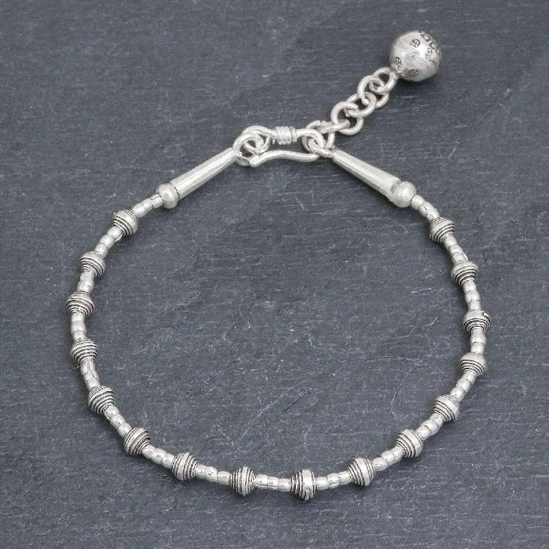 boho-inspired woven bracelet -Flower Ball Silver Link Bracelet with Extender Chain from Thailand